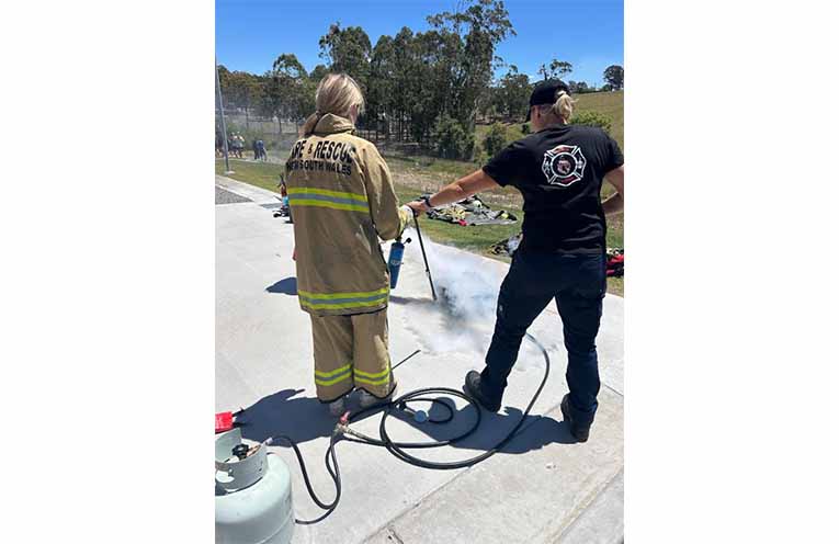 Local students participated in the Girls of Fire program last week, learning hands-on firefighting skills.