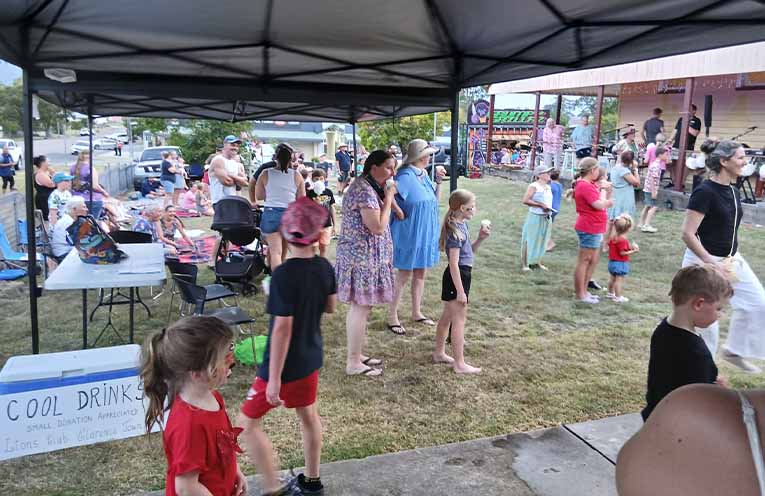 Taking in the market stalls and attractions.