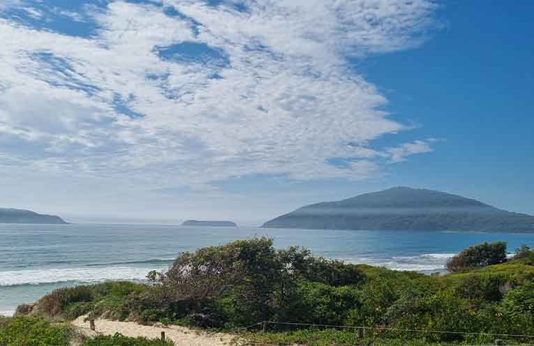 Atmospheric inversion causes thick smoke to linger over Myall Coast