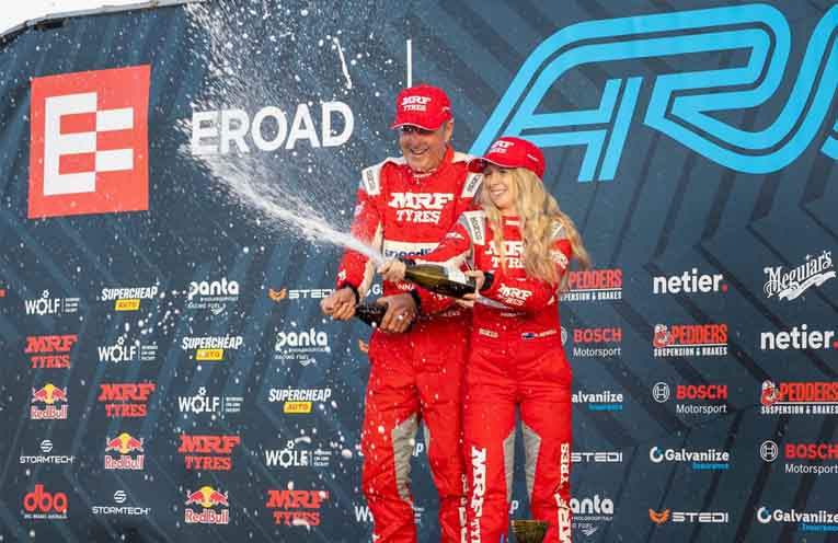 Rally car navigator Kaylie Newell with driver Tony Sullens in Tasmania. Photo: courtesy Bruce Thomas Photography.