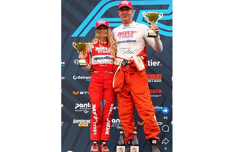 Rally car navigator Kaylie Newell with driver Tony Sullens in Tasmania. Photo: courtesy Bruce Thomas Photography.