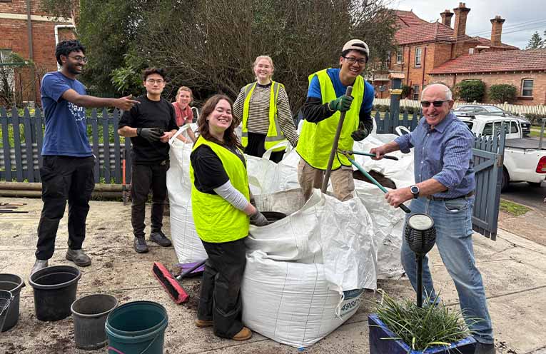Mayor Digby Raywood at the Paterson Hub and Harvest community gardens with UTS students.