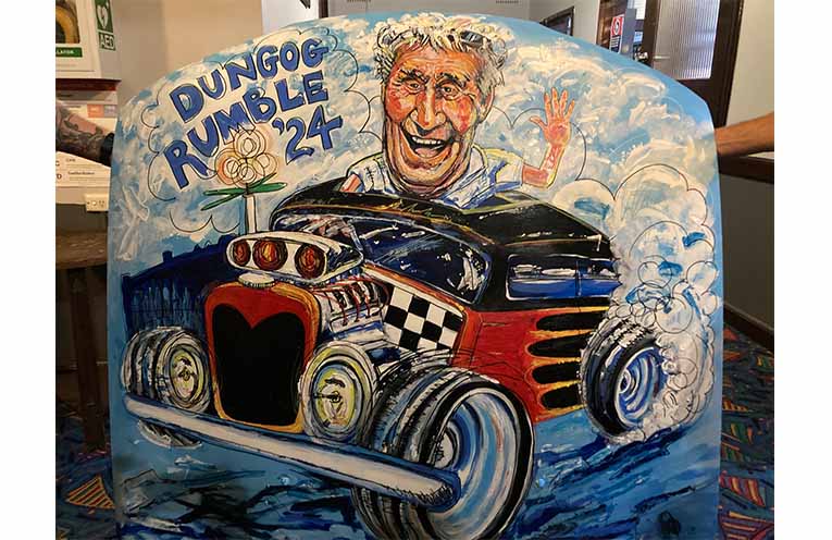 The late Bruce Clark was immortalised on a car bonnet painted by local artist Lisa Wiseman.