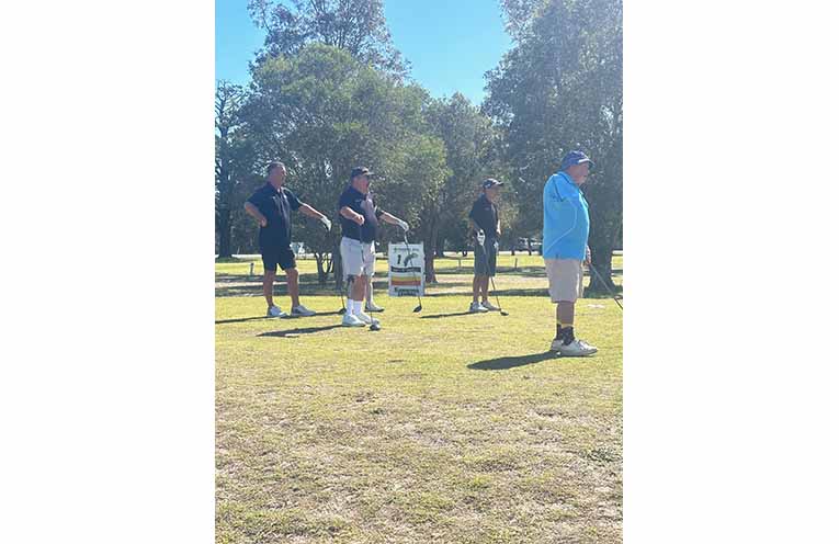The first group getting ready to tee off. Photo: Althea Guinsberg.