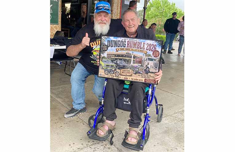 Thumbs up from Rumble president Malcolm Marquet for long-time sponsor and committee member Martin Throsby, who received a framed Rumble poster to acknowledge his support over 15 years. Photo: Cindy Fisher.